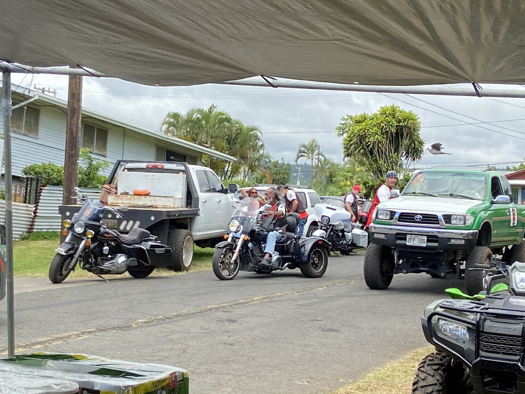 Motorcycles and club vehicles gather at the hub