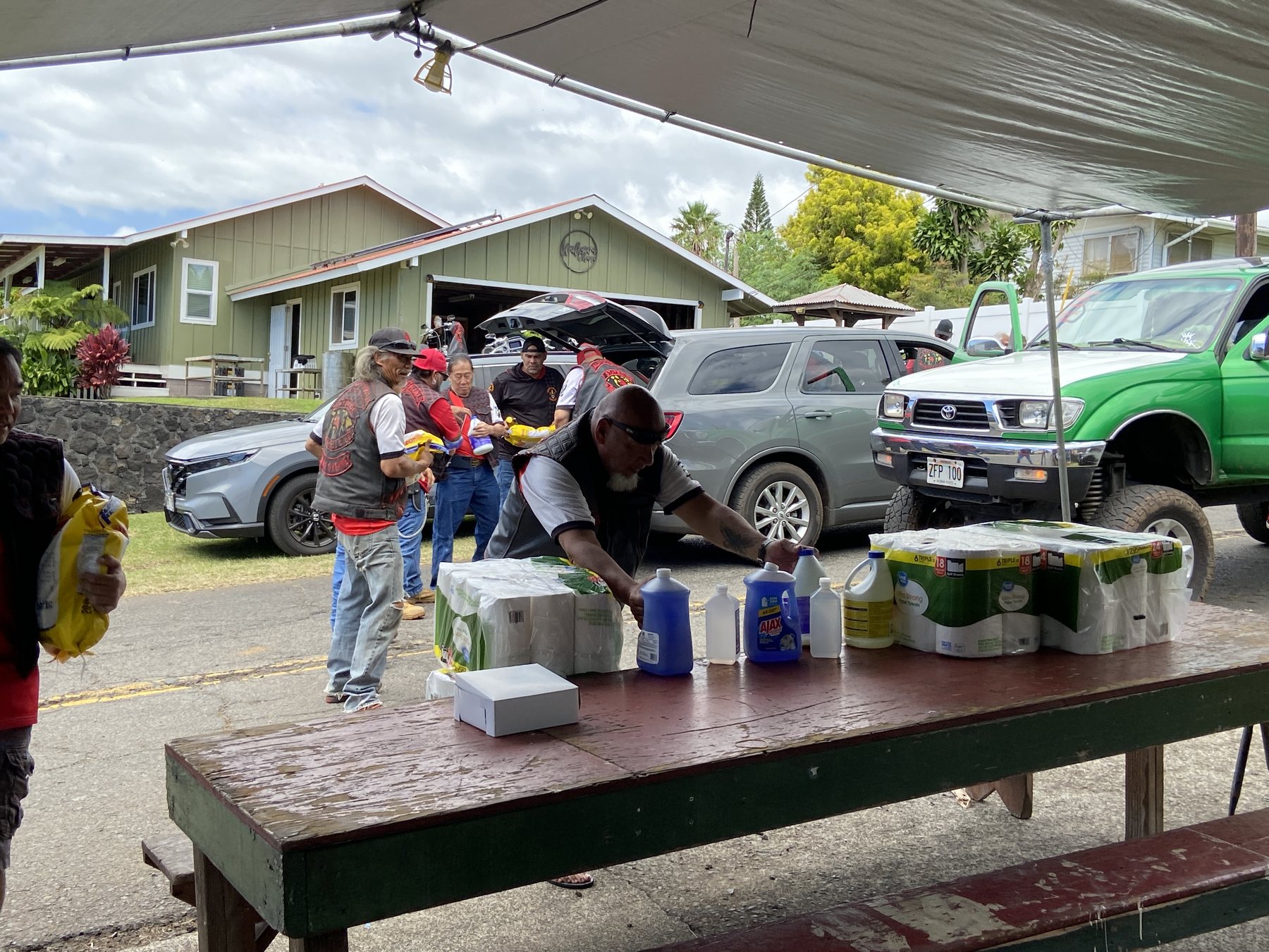 Relief supplies are staged under the hub canopy
